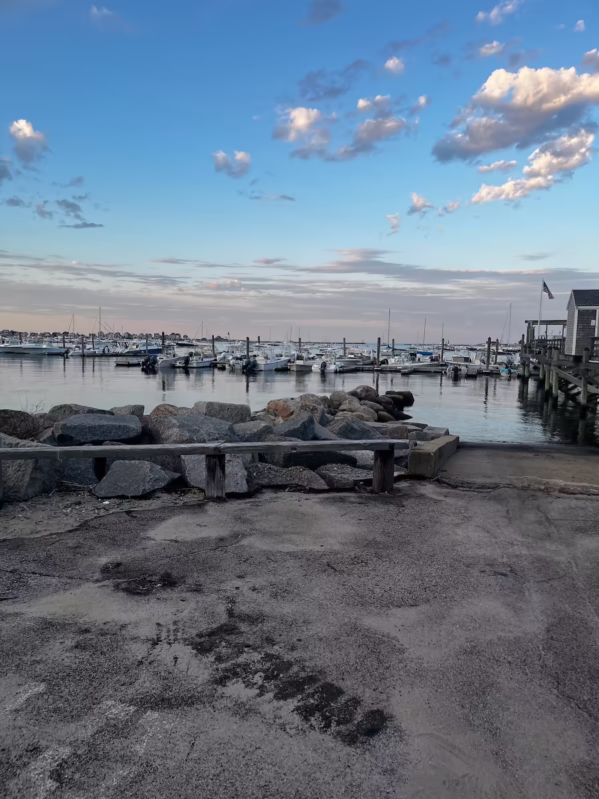 Harbor marina from the rocky boat ramp on a calm morning